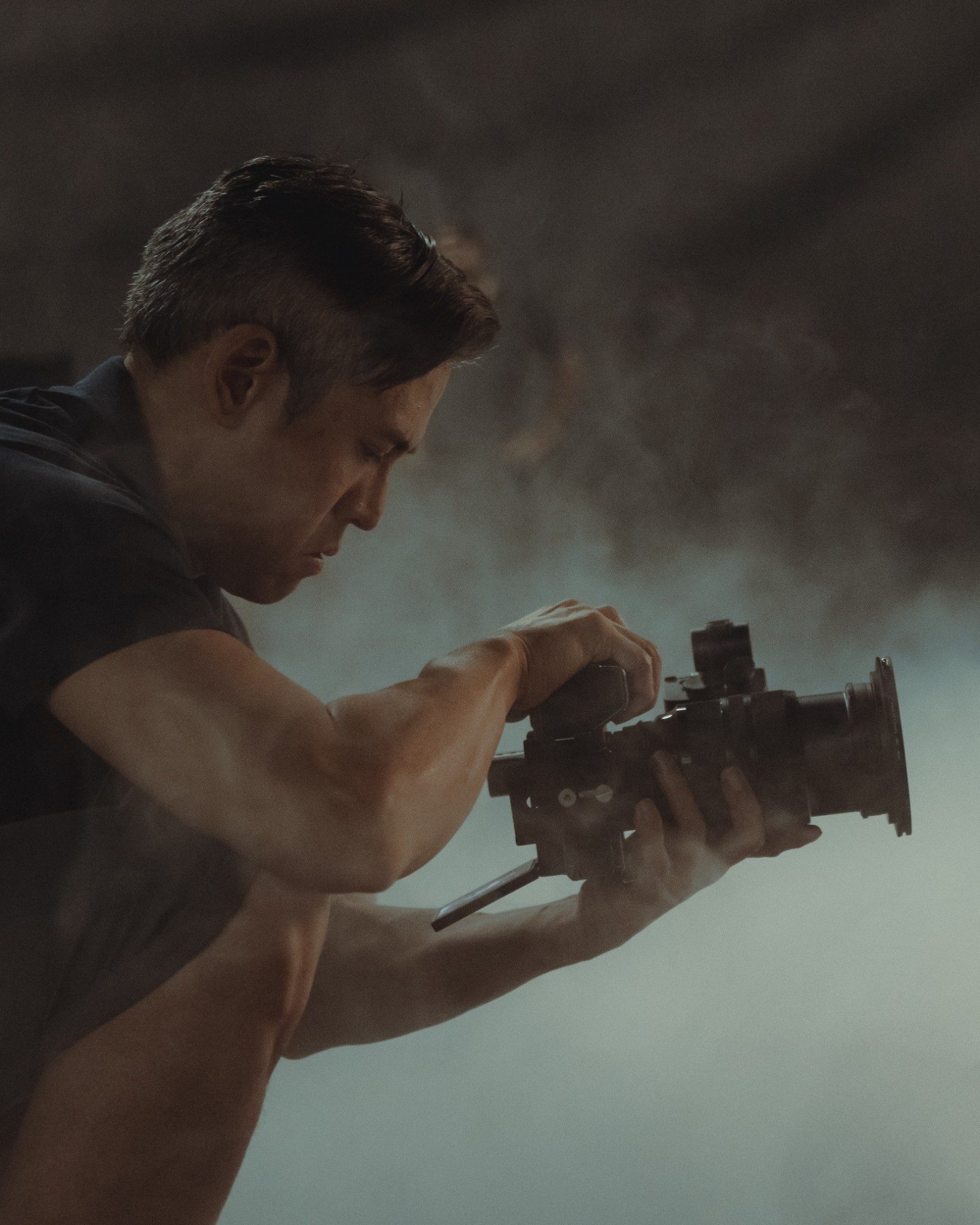 Director of photography lining up a shot through the fog