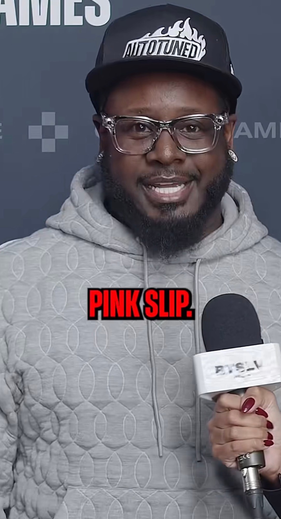 Ashley interviewing T-Pain on the Global Gaming League red carpet